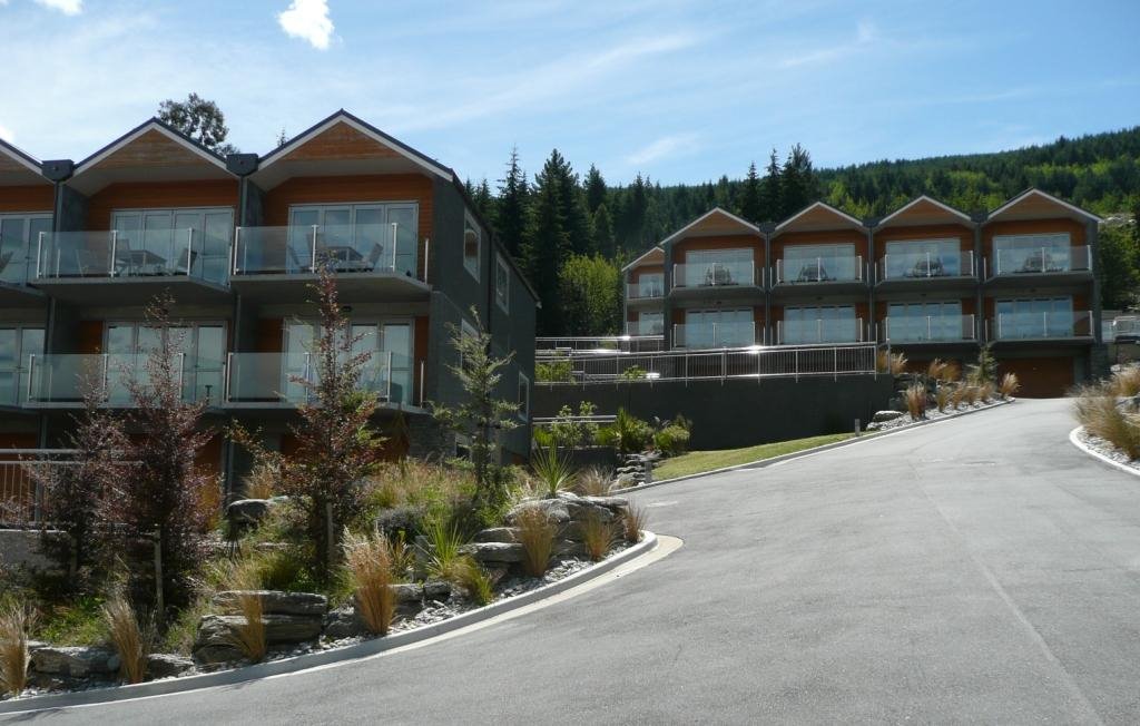 Alpine apartment buildings on a sloping Queenstown site
